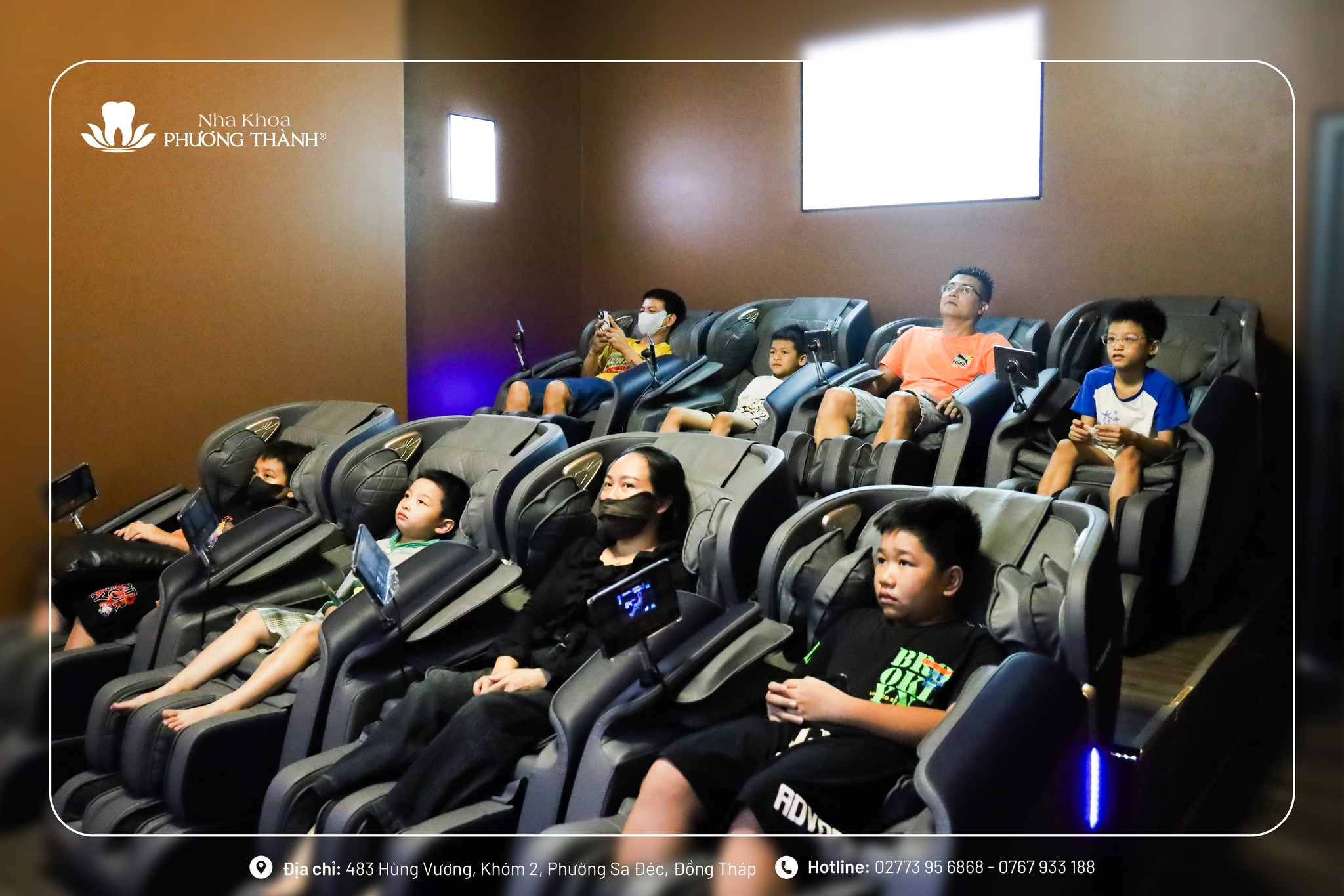 People relaxing in massage chairs.